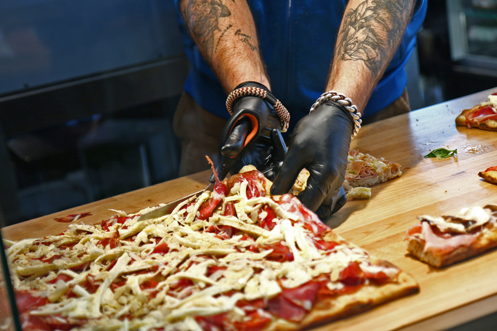 Les pizzas au mètre et au poids